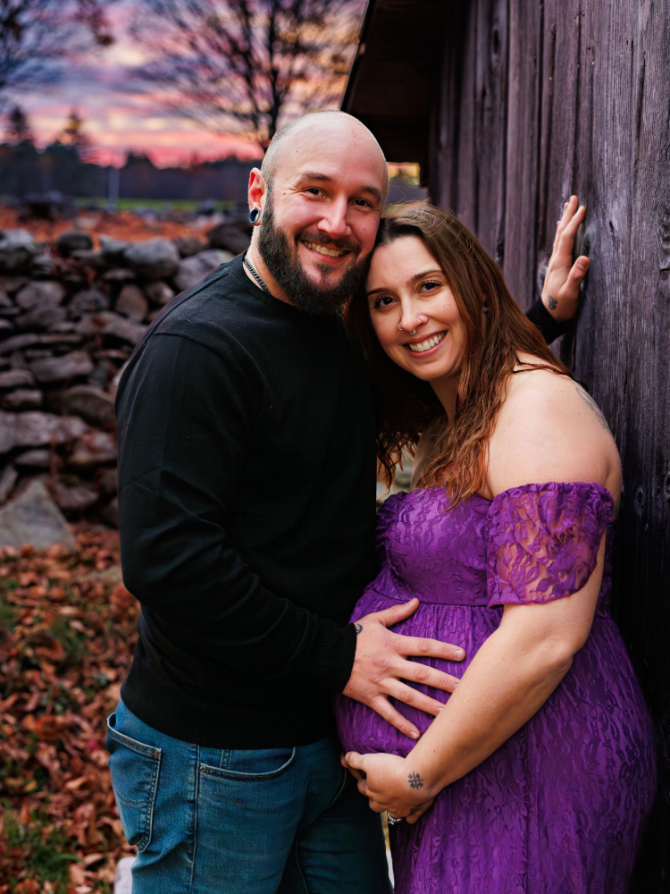Photography MA -a pregnant mother wrapped in a red cape. Maternity photography