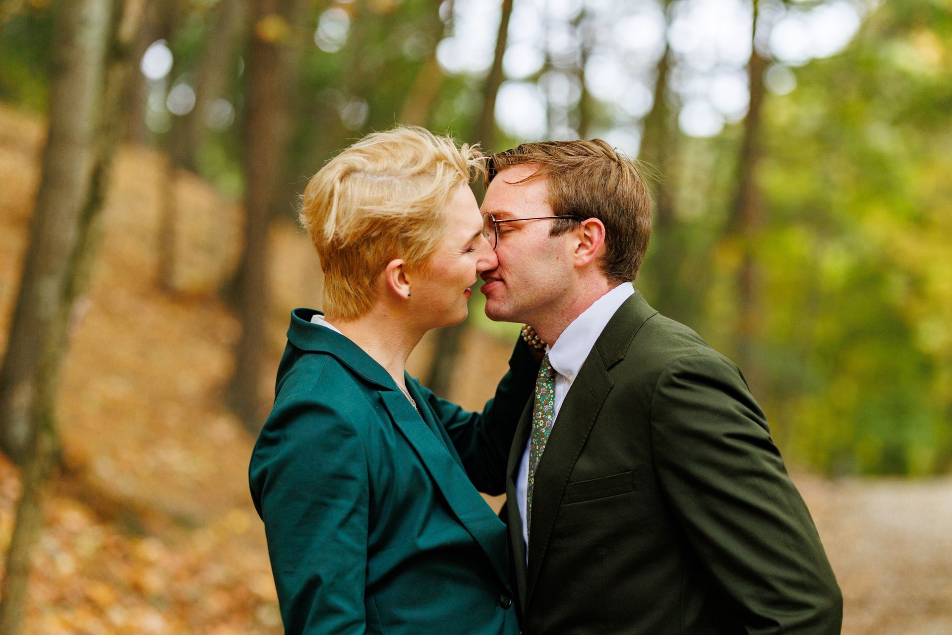 Gay couple kissing for wedding photos