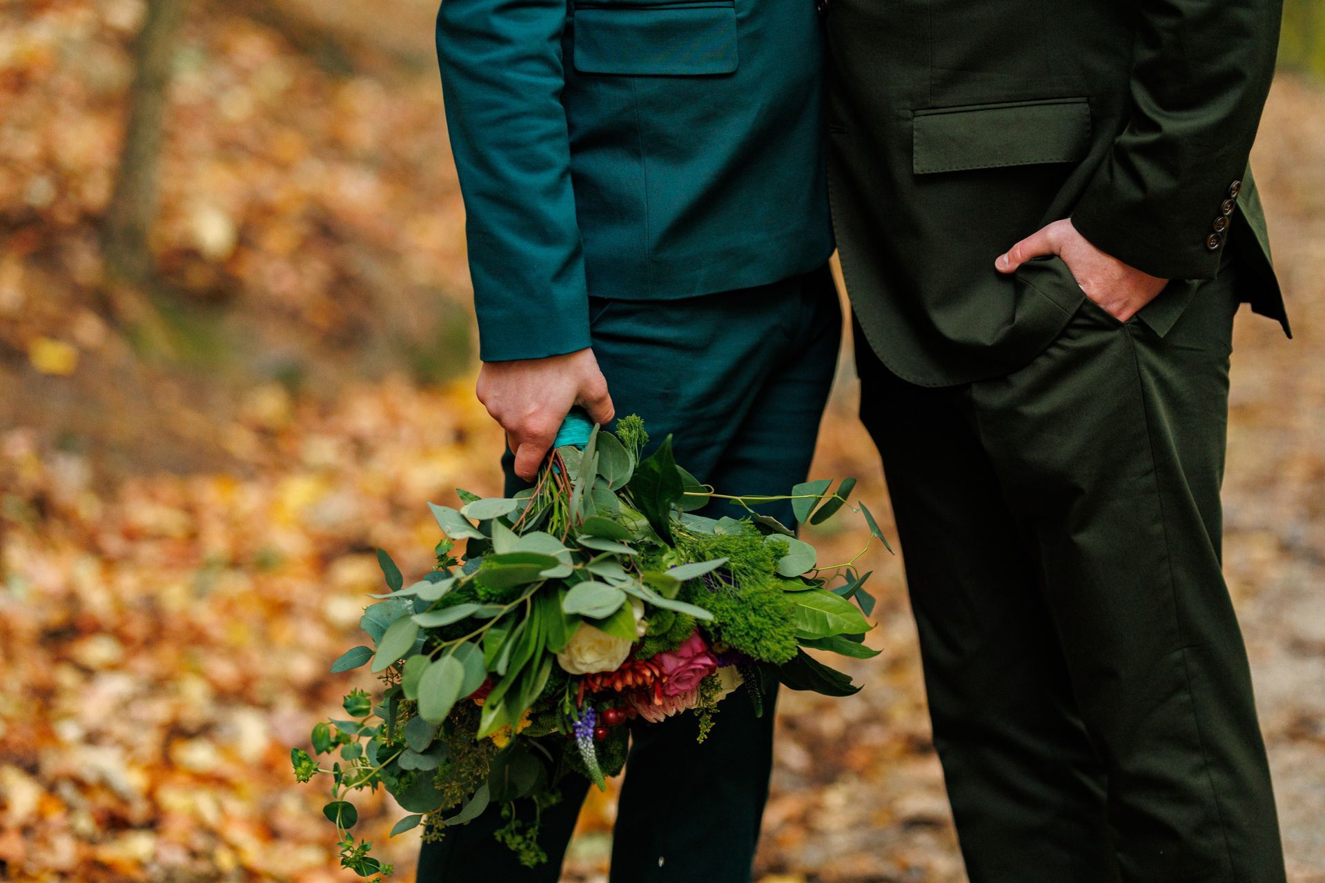 bouquet close up of gay couple