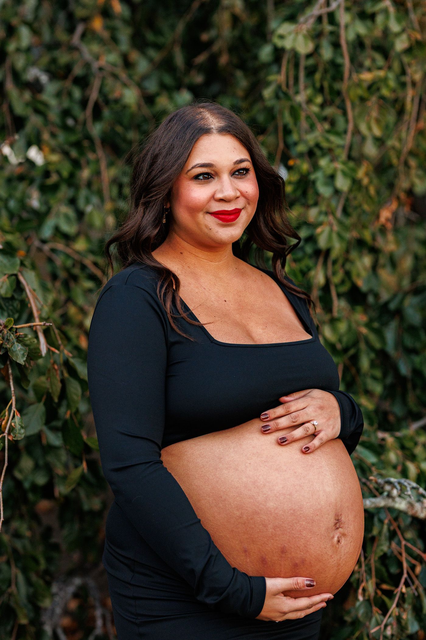 Maternity photography mom posing solo