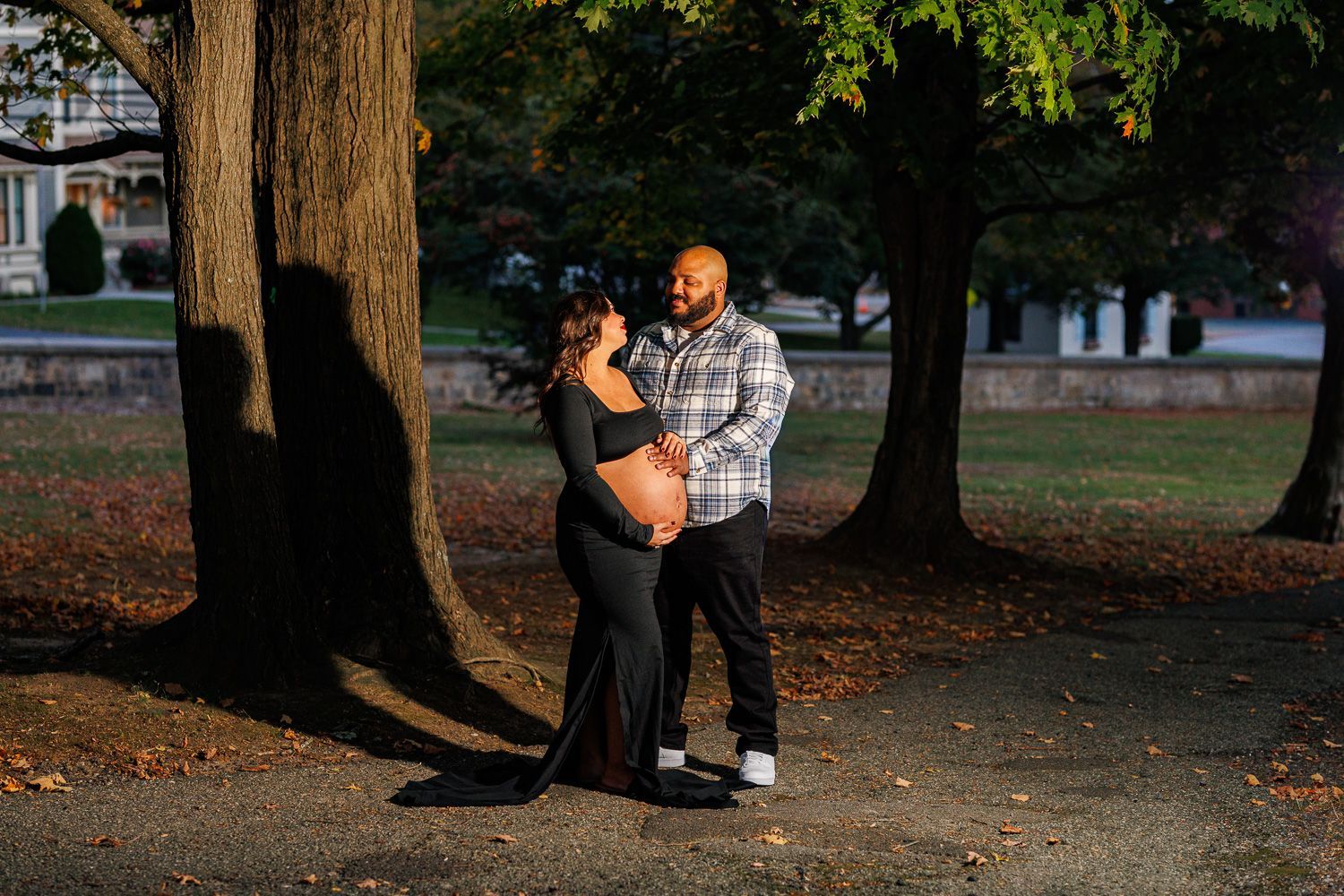 Maternity photography parents posing while looking at each other