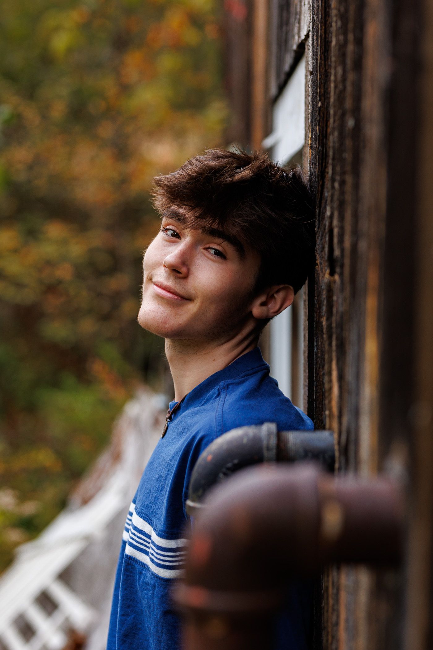 High school senior - senior photography - male student posing in front of old building
