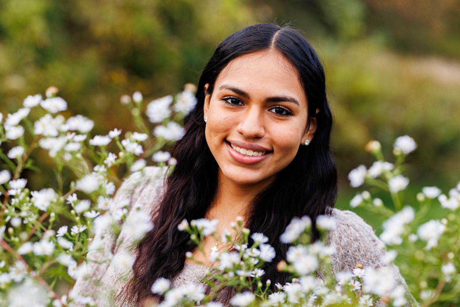 High school senior - senior photography - female student standing in flowers