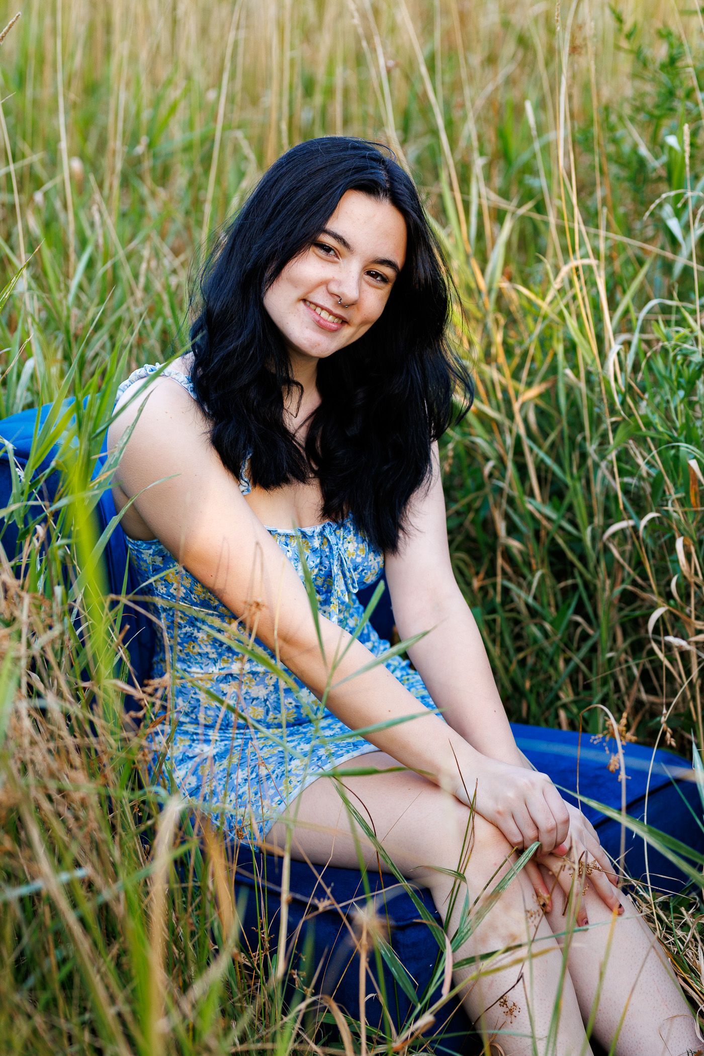 High school senior - senior photography - female student posing in field