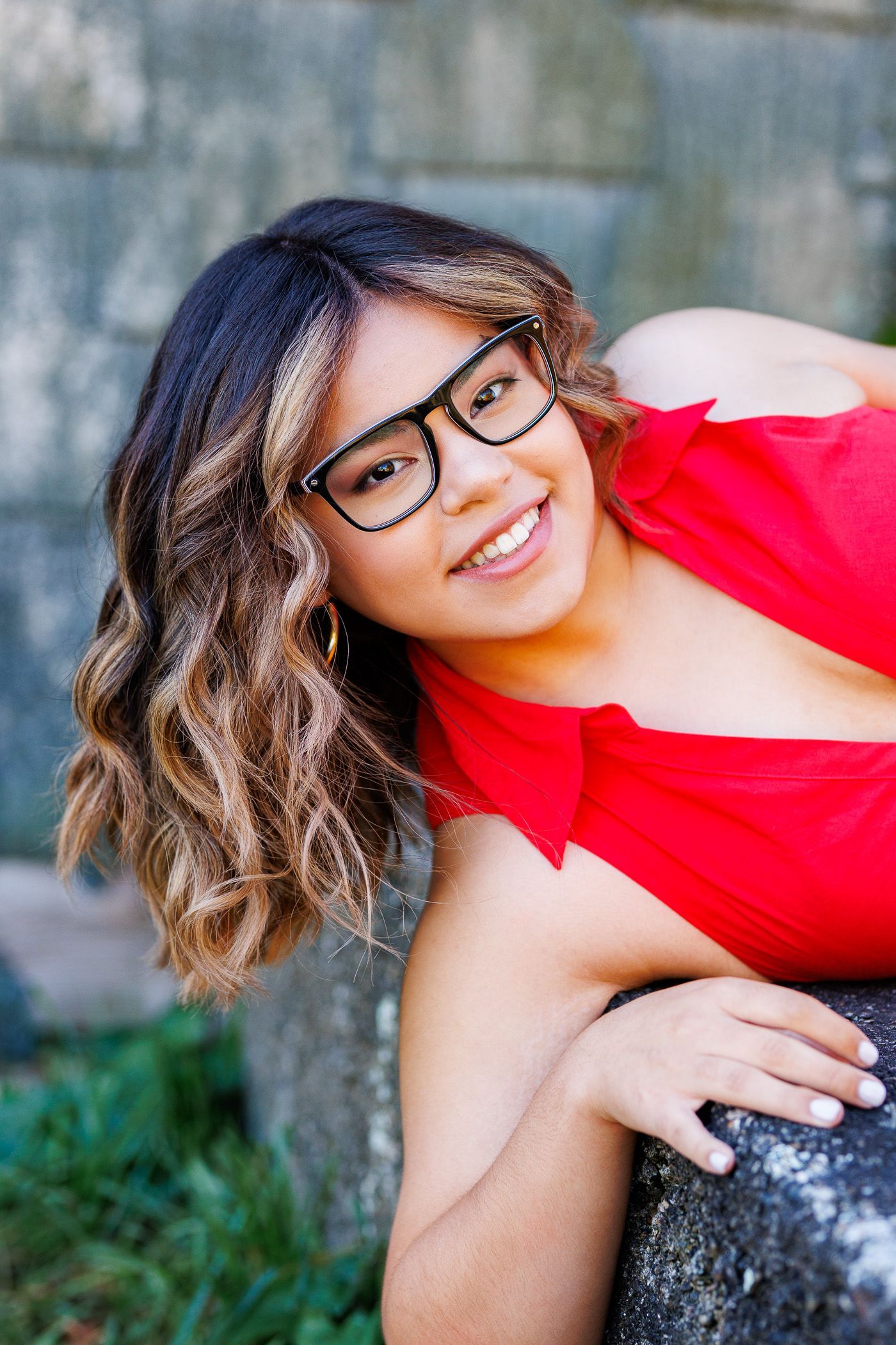 High school senior - senior photography - female student lying on ground