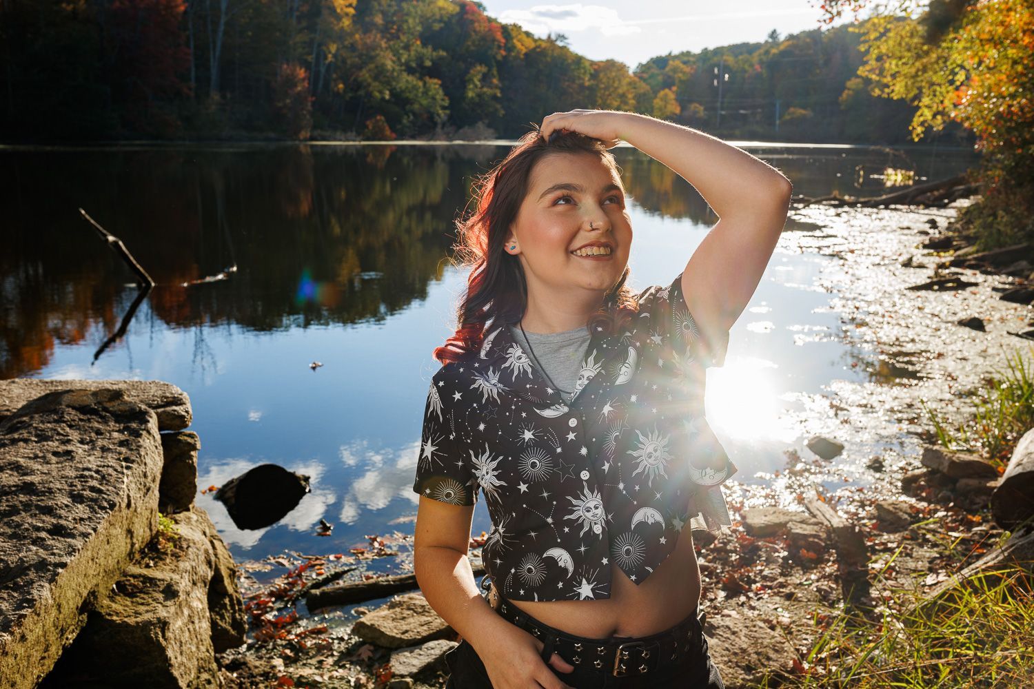High school senior - senior photography - female student posing in front of waterfront