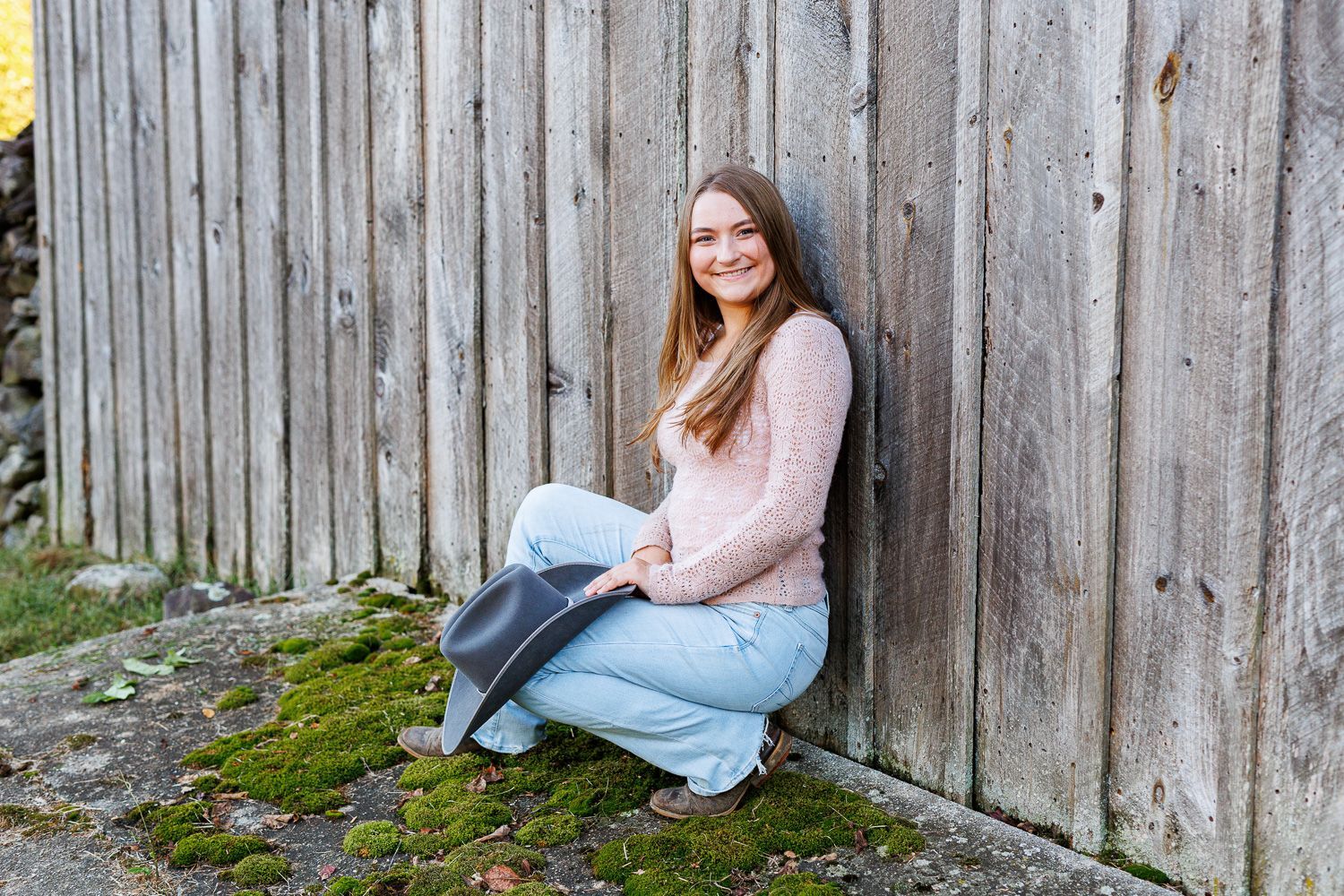 High school senior - senior photography - female student posing with cowboy hat