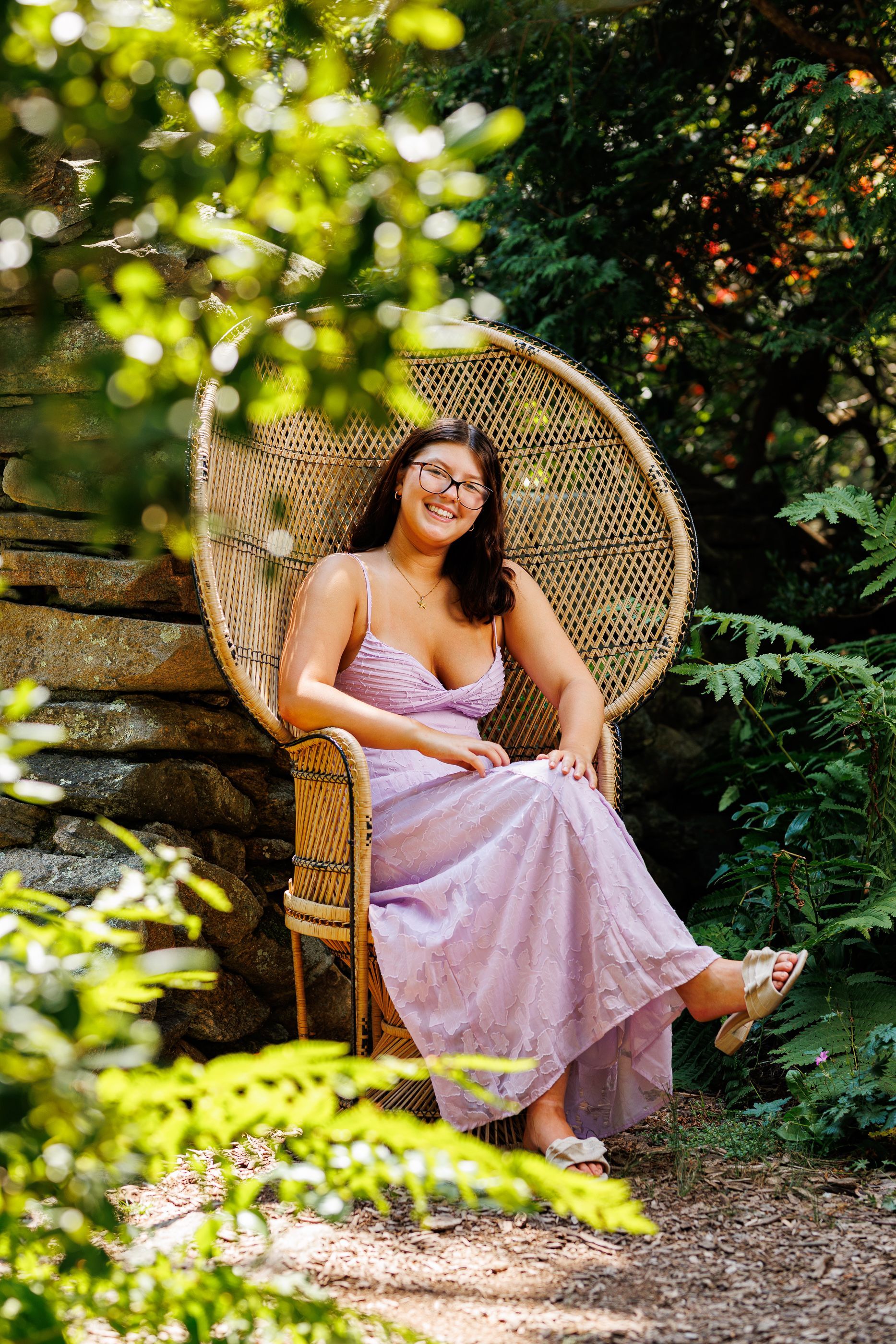 High school senior - senior photography - female student sitting in chair in a garden