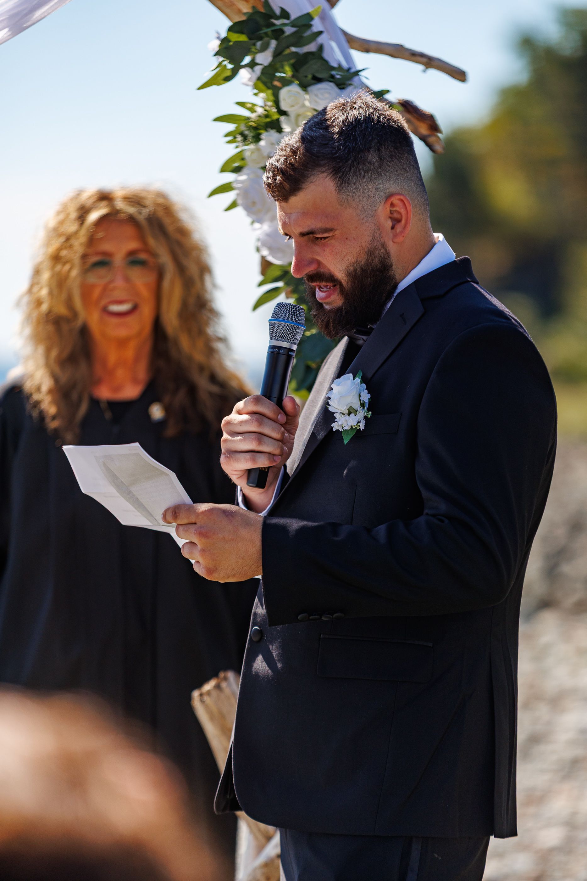 groom reciting vows during wedding at Oceanview, Nahant, MA