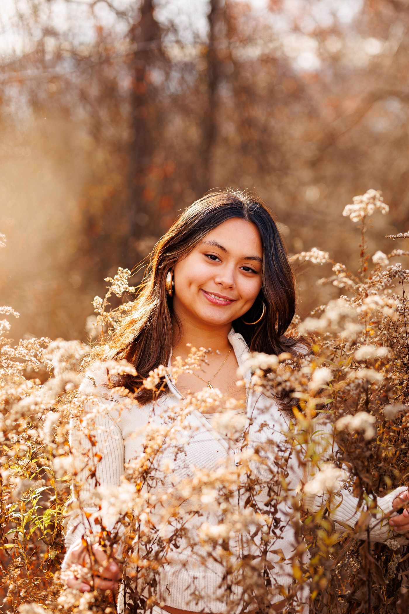 High school senior - senior photography - female student standing in field