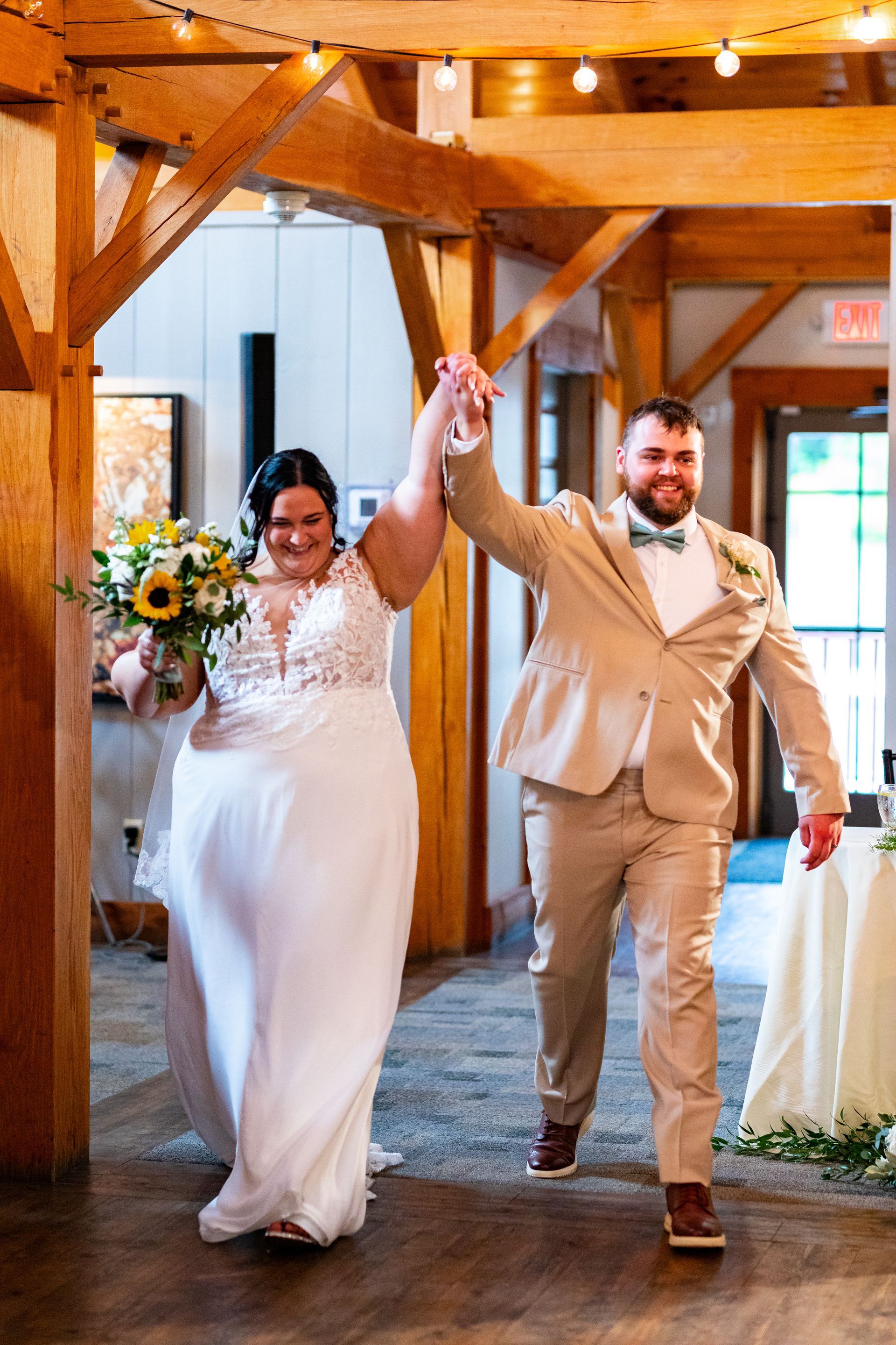 Couple entering wedding  at Barn at Wight Farm