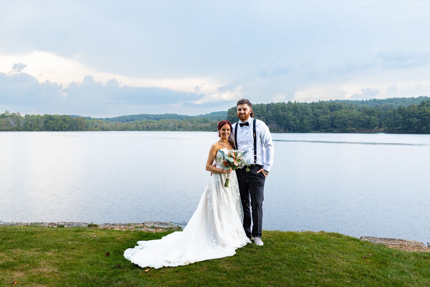 Bride and groom posing at Roseland Park in Woodstock, CT