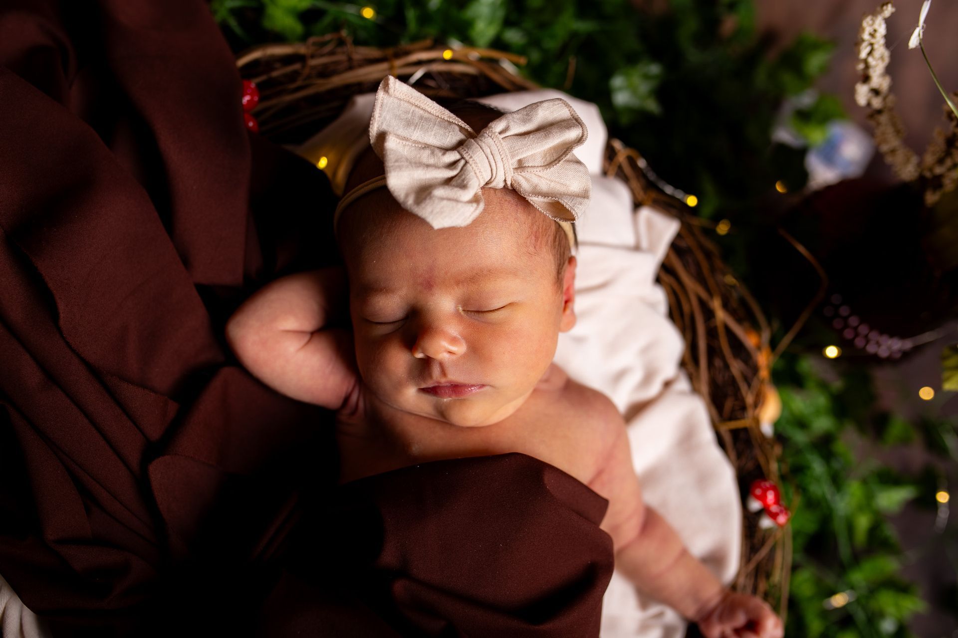Newborn photography baby girl swaddled