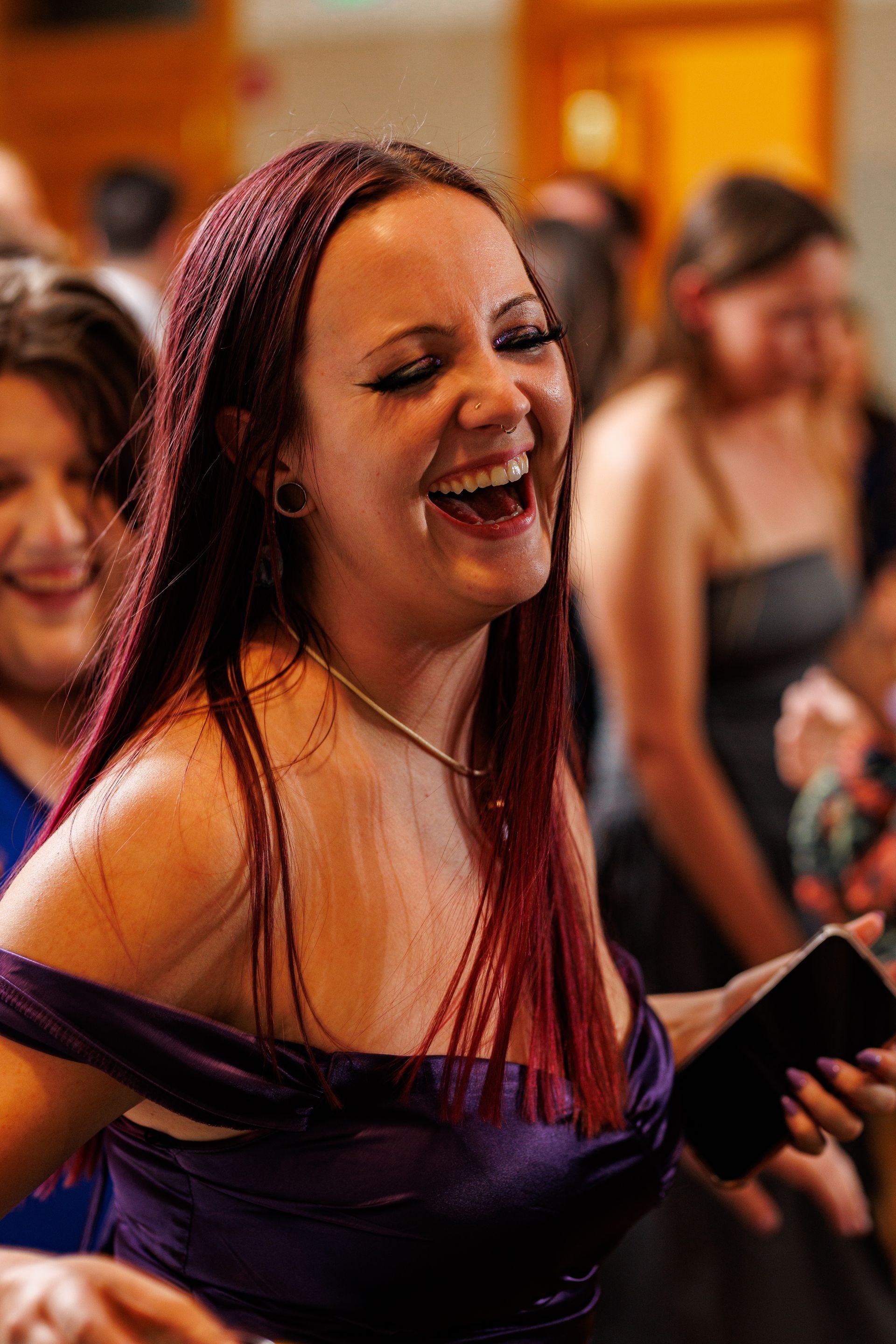 wedding party member dancing during reception
