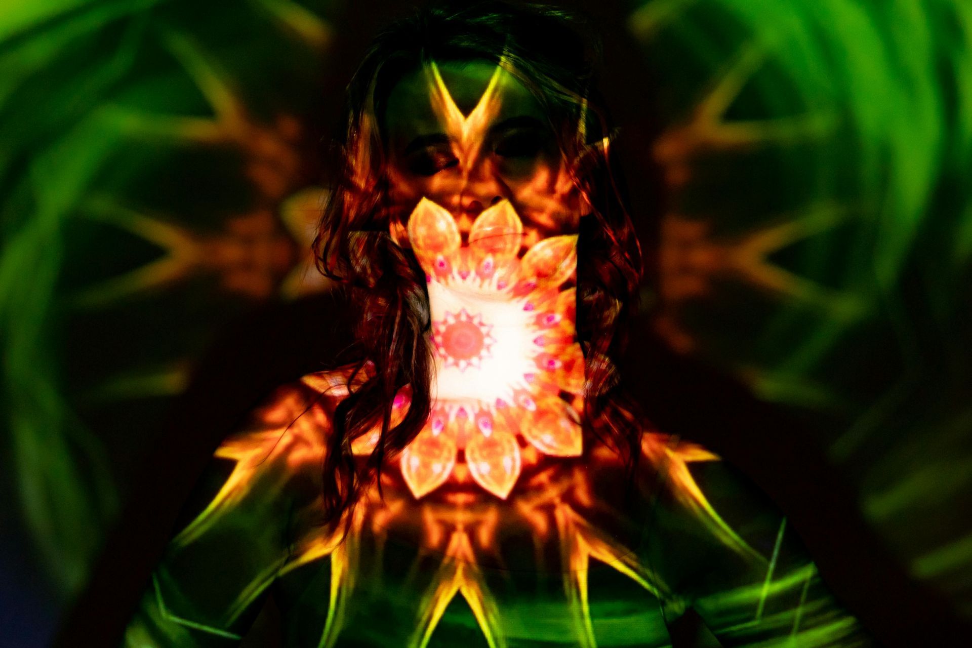 Portrait of woman with psychedelic lights overlayed.