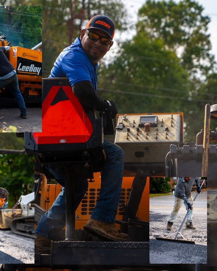 Man operating asphalt paving equipment outdoors, wearing sunglasses and a cap.