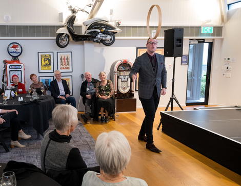 Performer entertaining residents on stage
