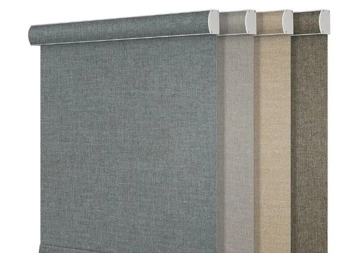 Rolled-up fabric shades in gray, beige, and taupe hanging side by side