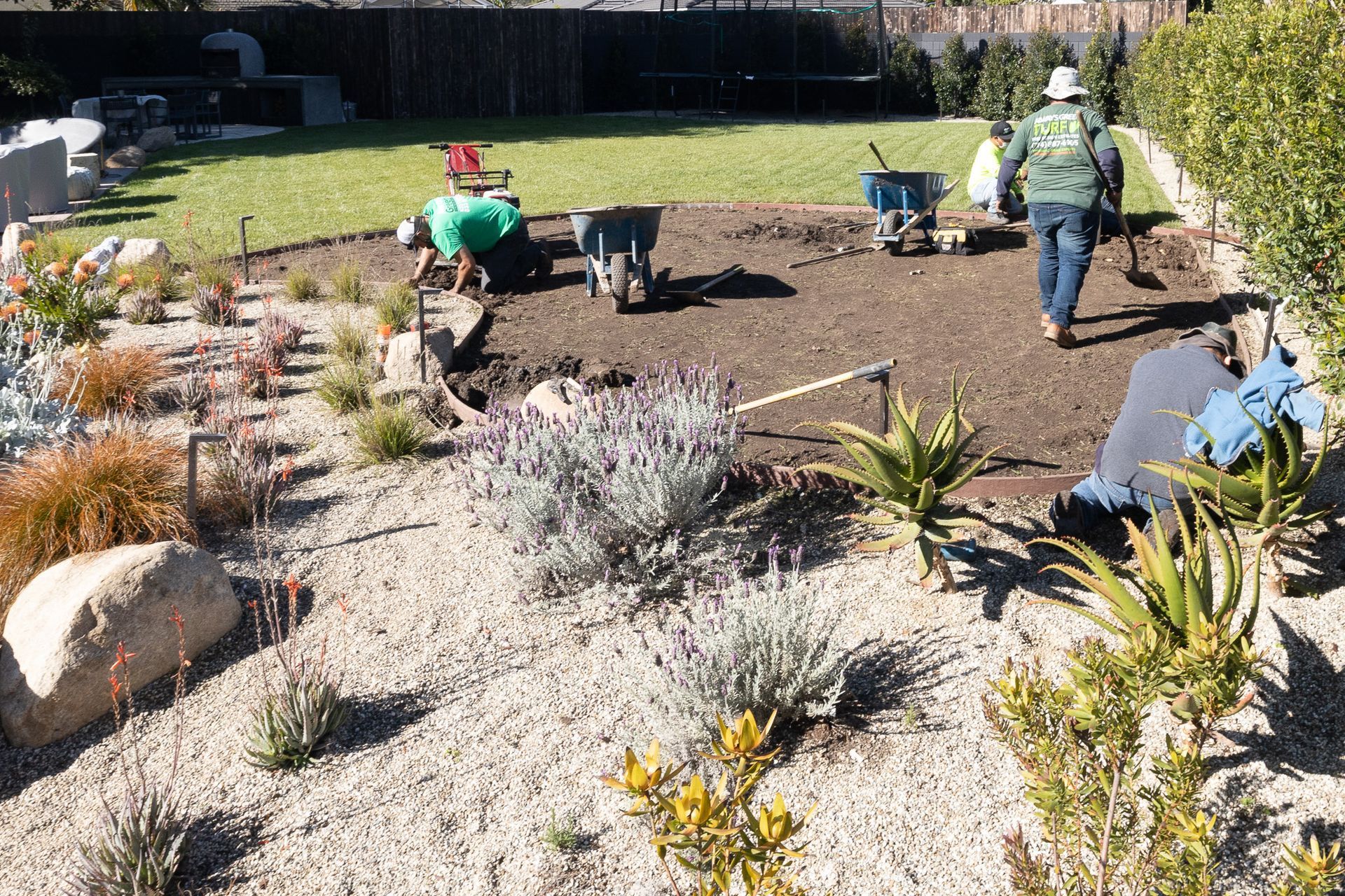 pots near artificial grass bocce ball