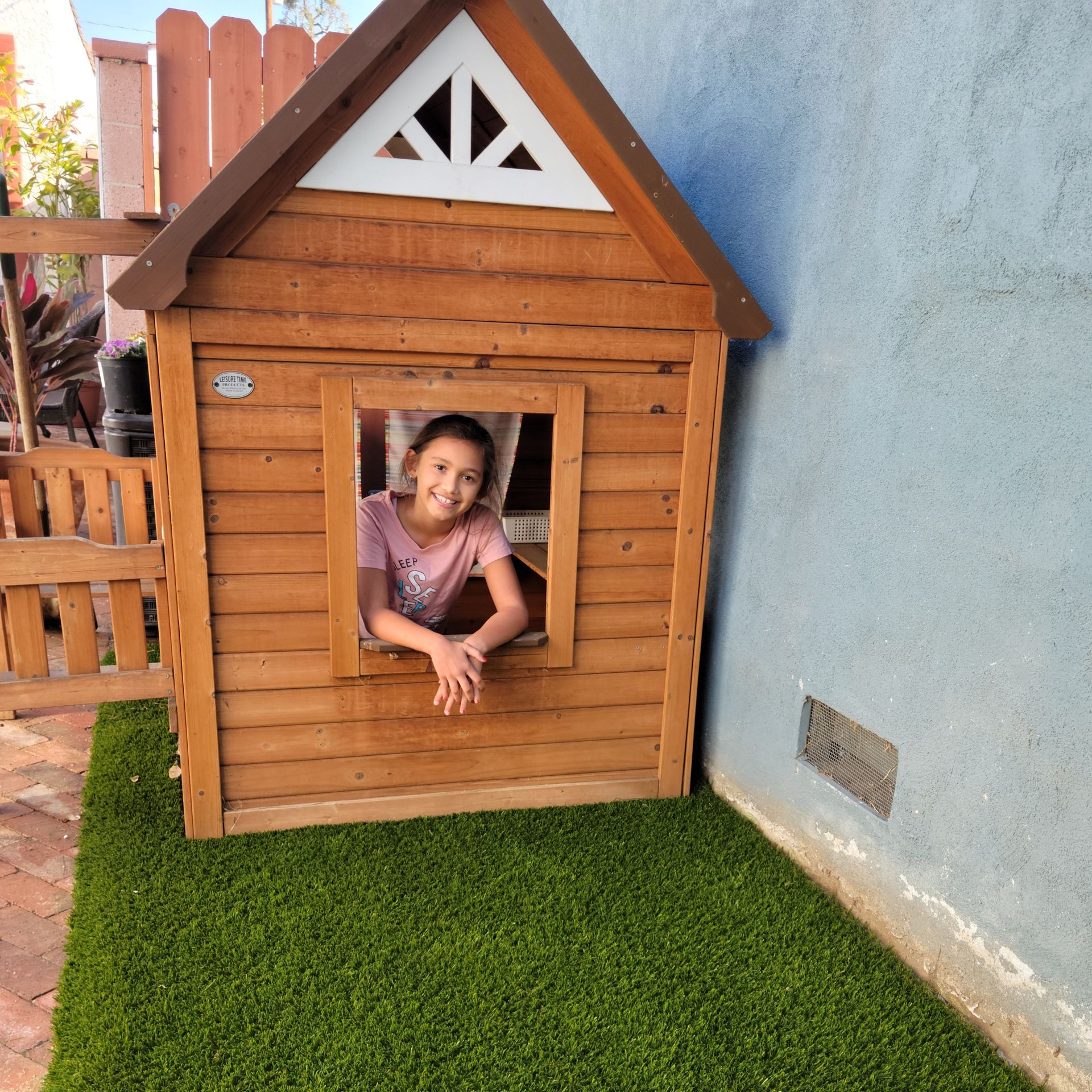 Playhouse on artificial grass in Buena Park
