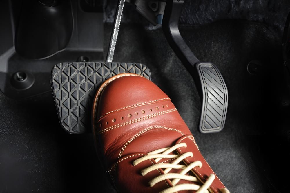 Person is Pressing the Brake Pedal of a Car — Kirk Auto Know Mechanical in Stuart, QLD
