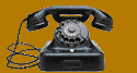 Black rotary telephone on a golden background.