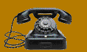 Black rotary dial telephone on a gold background.