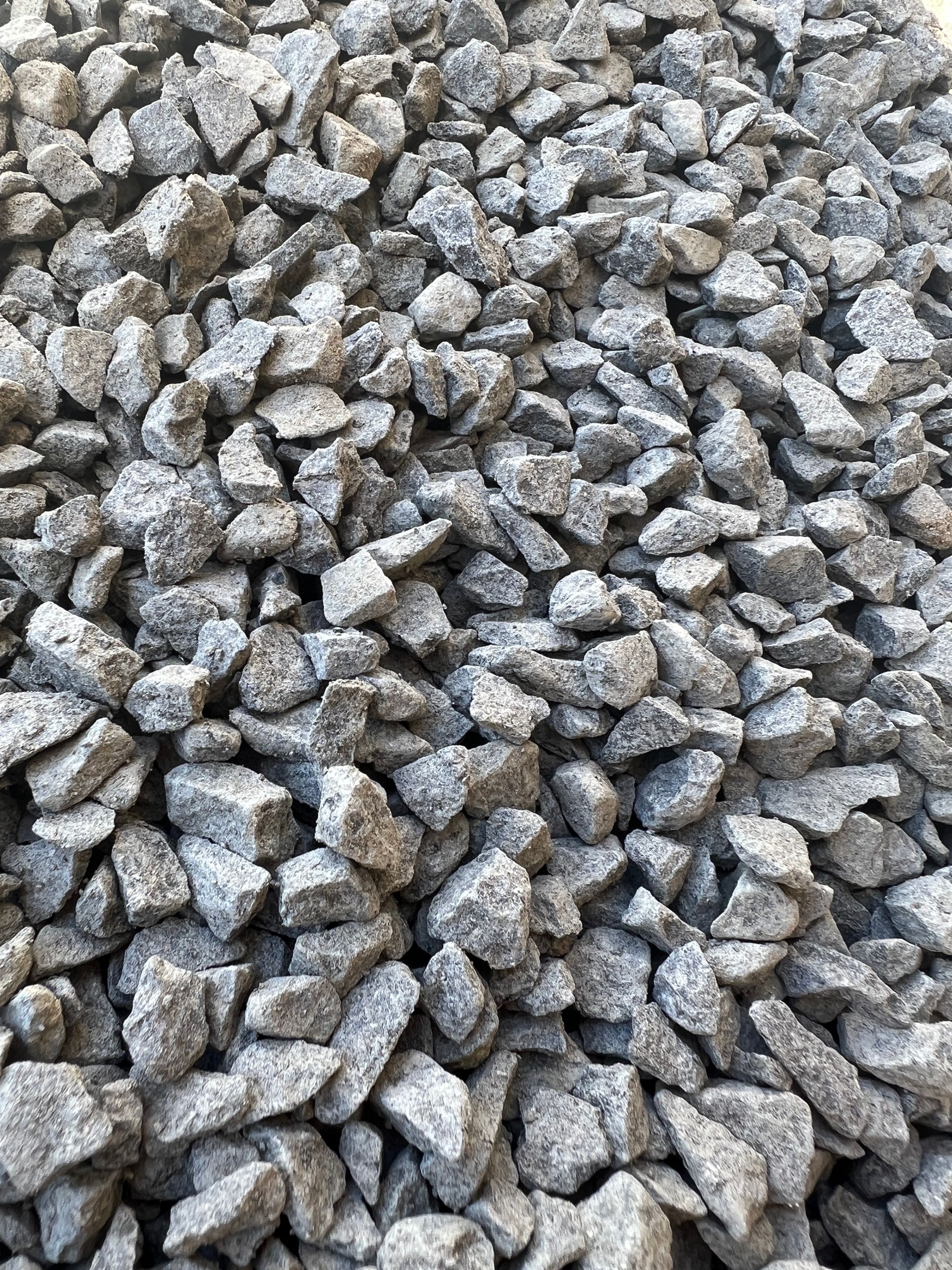 A Large Pile Of Gravel Is Sitting On Top Of A Dirt Field — Pigot's Mid Western Sand and Soil In Orange, NSW