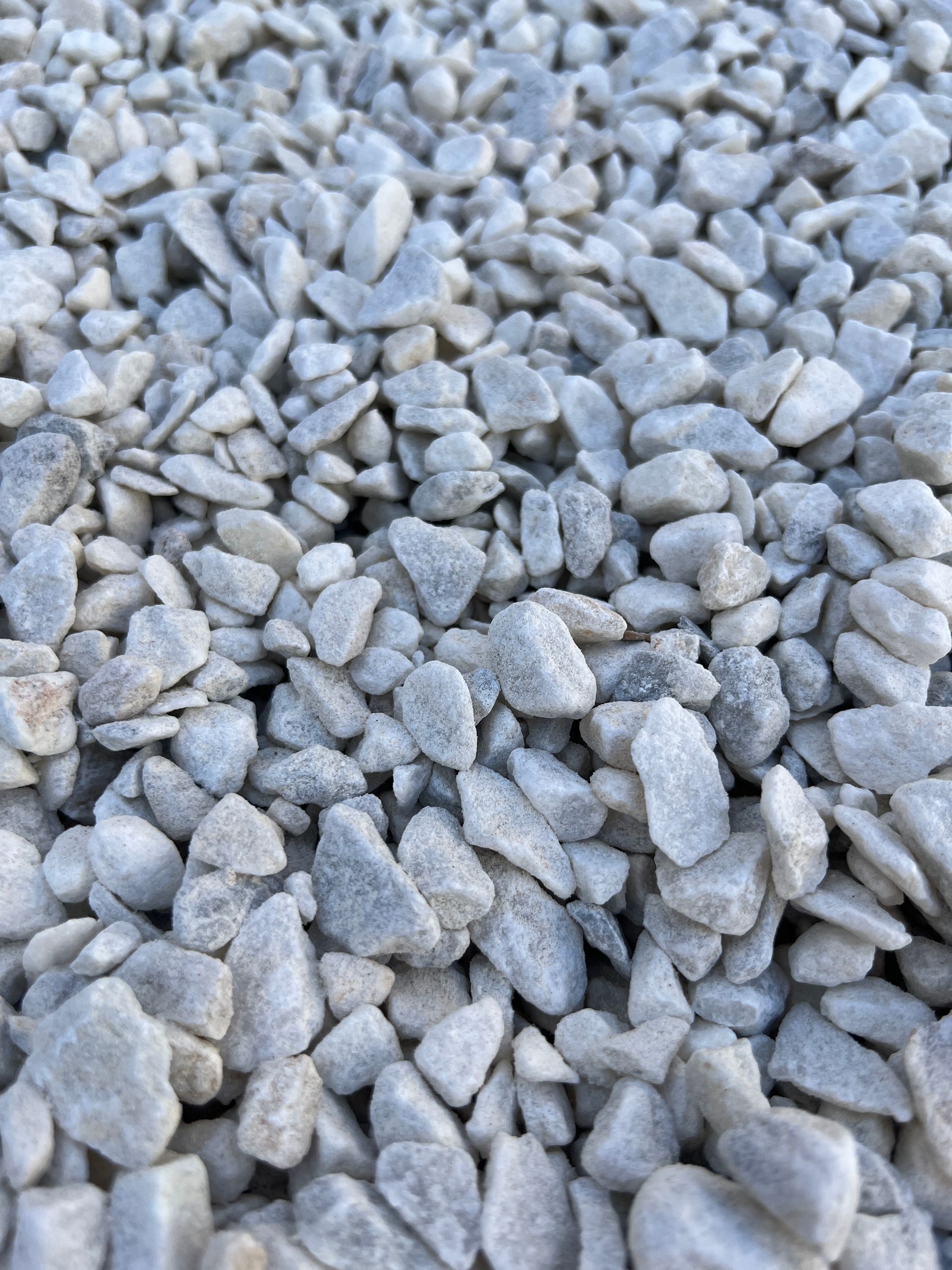 A Pile Of White Gravel Is Sitting On The Ground — Pigot's Mid Western Sand and Soil In Orange, NSW