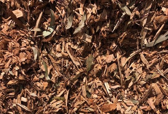 A Pile Of Brown Mulch With Leaves On It — Pigot's Mid Western Sand and Soil In Orange, NSW