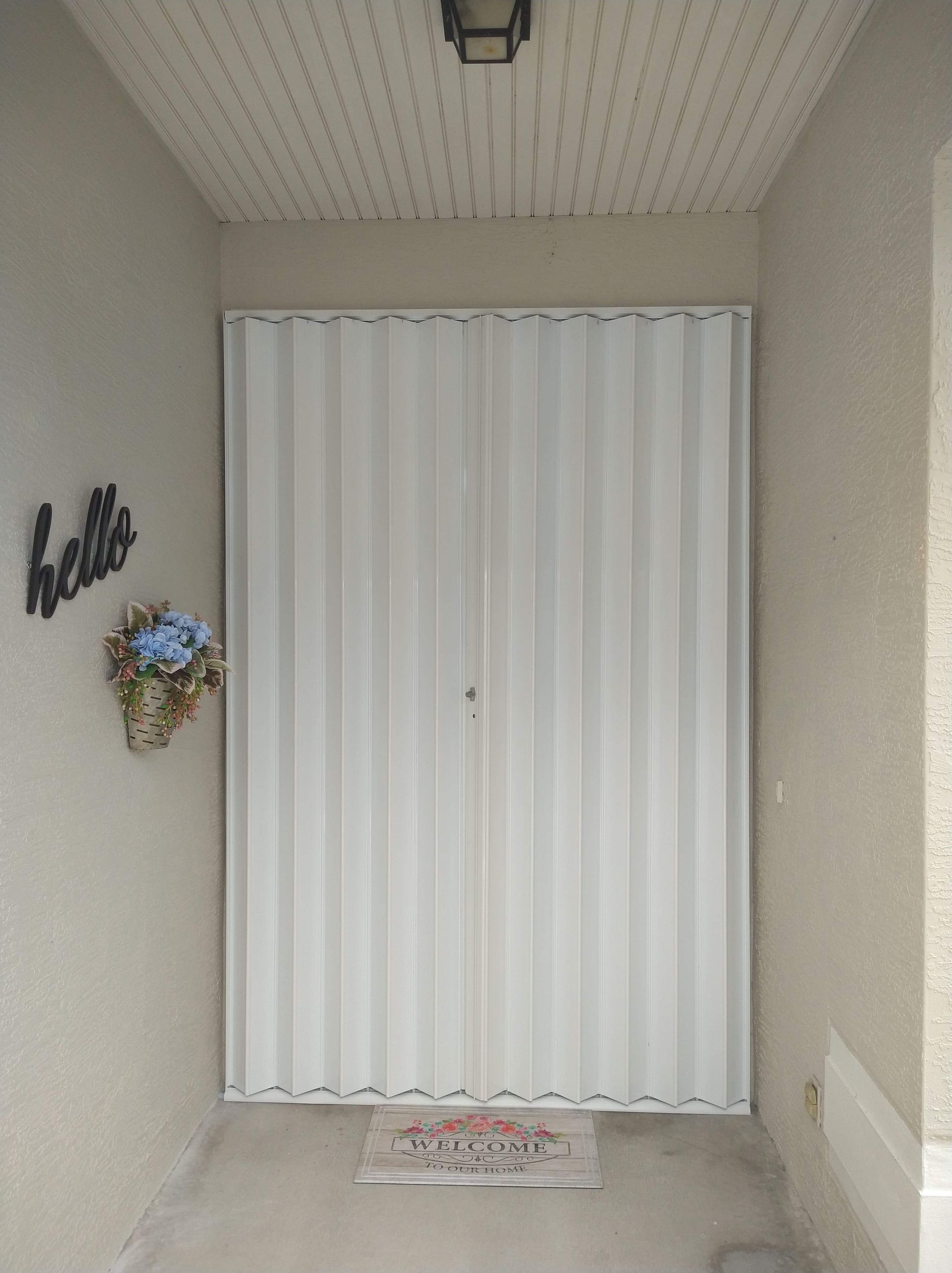 White Accordion Shutter - Melbourne, FL - Roll Tite Shutters