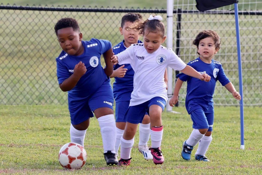 Albion Hurricanes FC youth players in a game