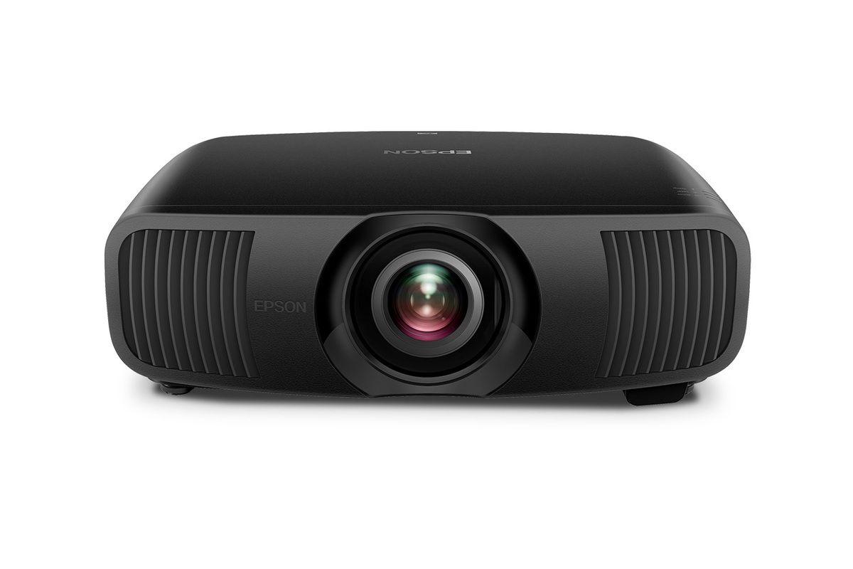 Black home theater projector with central lens and side vents on a white background