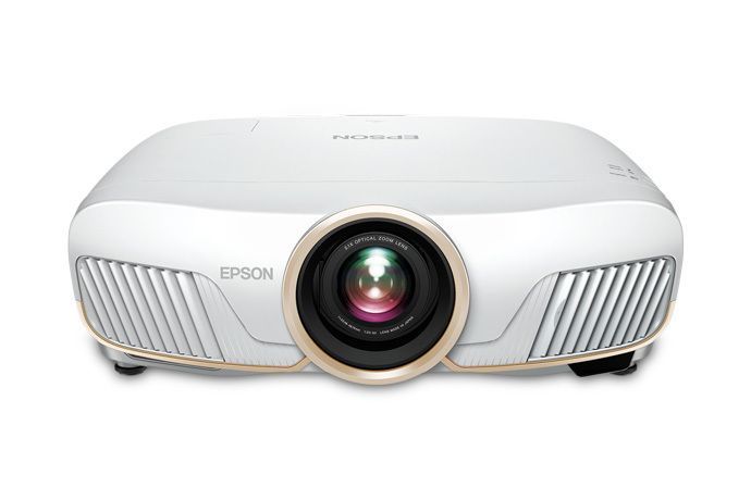 White Epson projector with central lens on a plain background