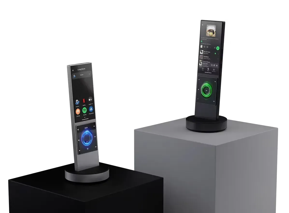 Two foldable smartphones displayed on black and gray pedestals, showing colorful screens.