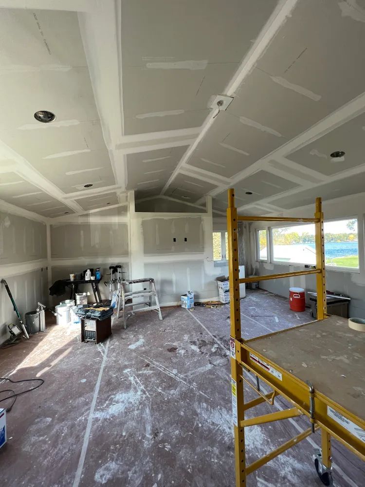 A large room with a scaffolding in the middle of it.