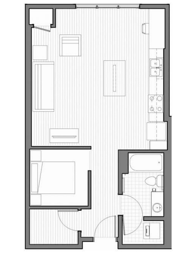 A black and white floor plan of a small apartment with a bedroom , living room , and kitchen.