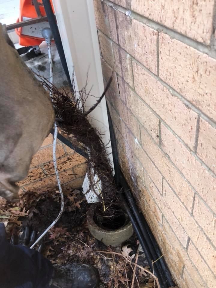 Person Using Wrenches to Repair a Bathroom Sink's Plumbing — Precise Plumbing & Drainage in Belconnen, ACT