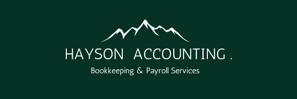 British Columbia small business owner reviewing bookkeeping and financial reports for 2026 planning