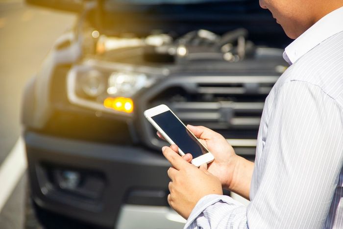 Man Calling for Professional Mechanic