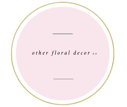 Pink circular logo with gold outline and the text “other floral decor >>”