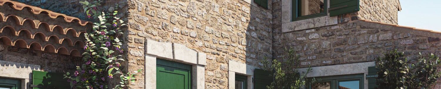 Een close-up van een stenen gebouw met groene luiken.