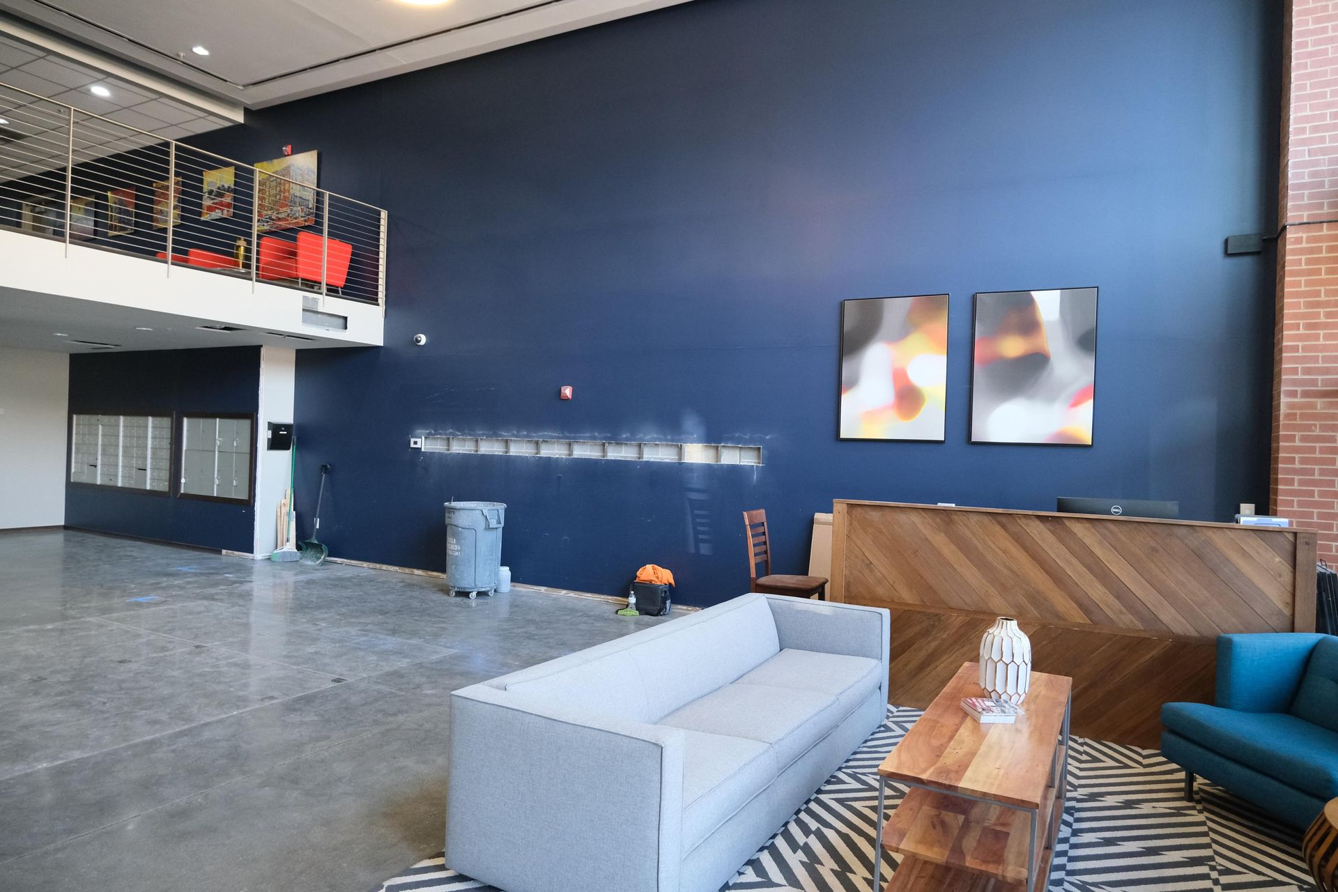 A living room with a couch and a table