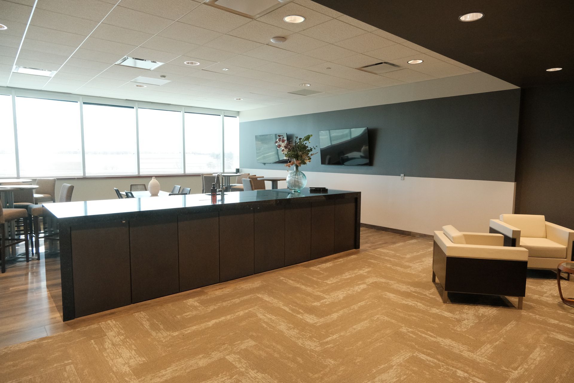 There is a large counter in the middle of the room.