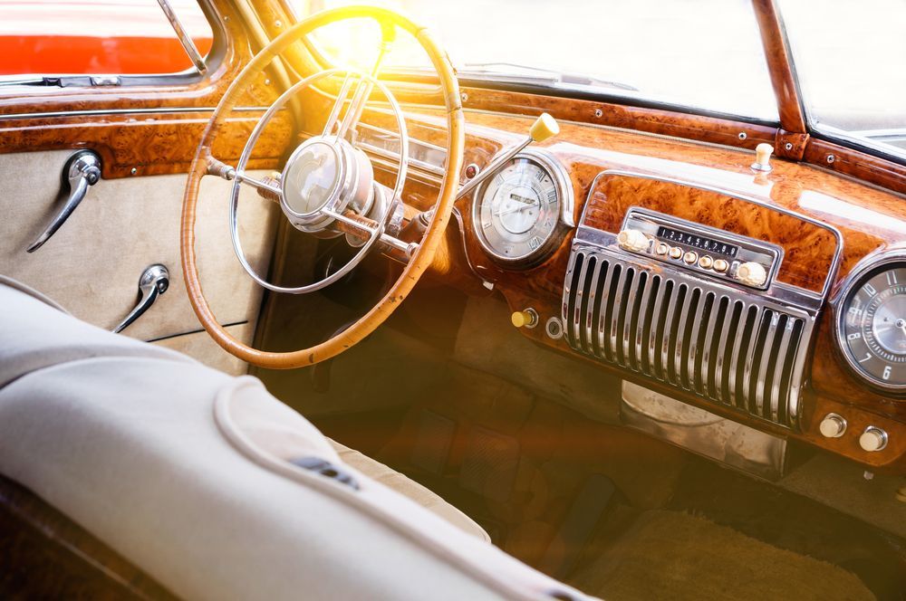 A Lot of Cars Are Sitting on Lifts in A Garage — Carline Automotive Solutions in Bungalow, QLD