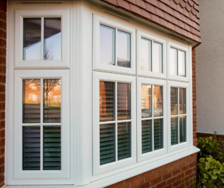 Newly installed windows featuring Replacement Double Glazed Glass on a modern home exterior.