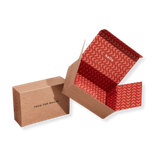 Two brown cardboard boxes, one open with red patterned interior, displayed on white background