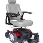 Light gray motorized wheelchair with black base and armrests, shown in profile on a white background
