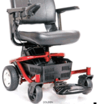 Red motorized wheelchair with black seat and controls on a white background
