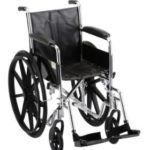 Black wheelchair with large rear wheels and footrests on a white background